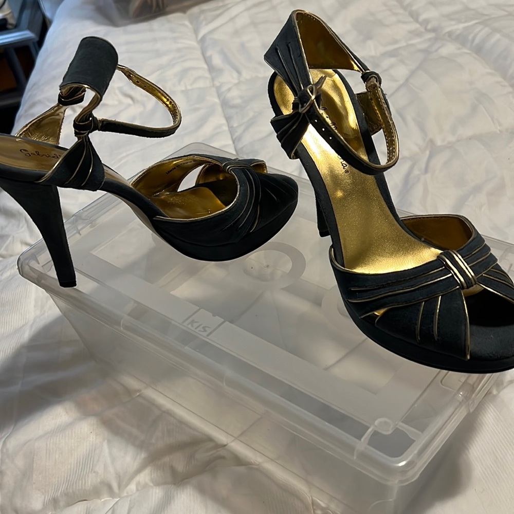 Gabrielle Rocha blue suede sandals wirh gold detailing throughout sandal .